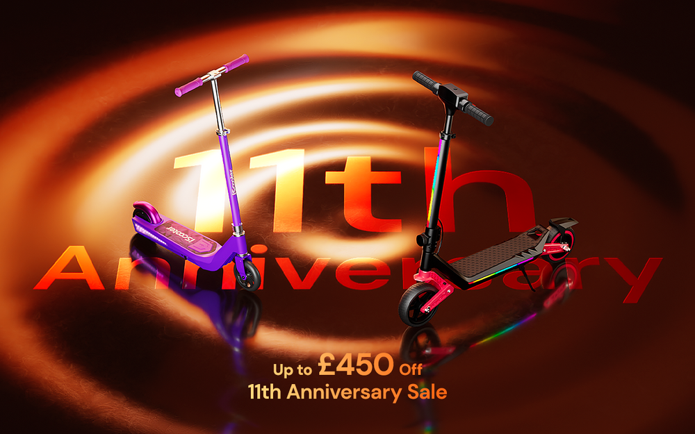 This promotional image features two kids' electric scooters on a golden, rippled background to advertise an 11th Anniversary Sale with discounts of up to £450.