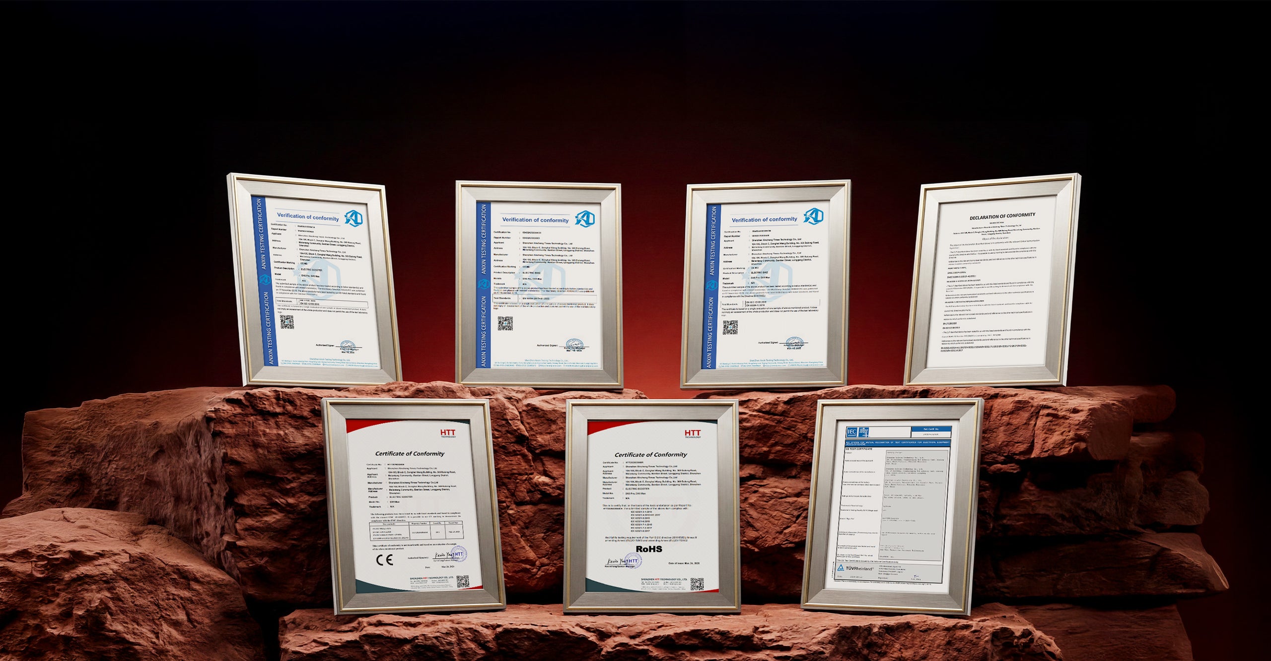 Wide display of framed certification and compliance documents arranged on layered stone platforms, showcasing the iScooter DX5 Max electric bike's adherence to safety, quality, and international testing standards.