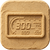 LCD dashboard icon embossed on a textured tan square background, featuring a digital display with speed, battery, and ride information indicators. The simple graphic represents a clear LED/LCD screen, real-time ride data, and enhanced display visibility.