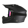 Side profile of a matte black full-face dirt bike or motocross helmet with tinted, iridescent goggles attached over the eye port and a DOT safety certification badge visible near the lower base.