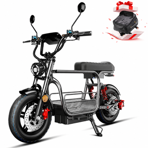 Studio product shot of a matte black DX5 electric scooter isolated on a white background, with a small graphic inset showing a top-bar storage bag popping out of a red ribbon gift box.