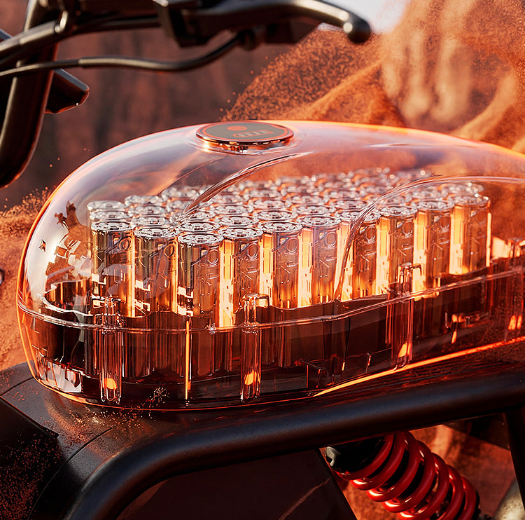 Transparent battery housing on the iScooter DX5 Max electric bike, showcasing the high-capacity battery cells and removable battery design with illuminated internal components.