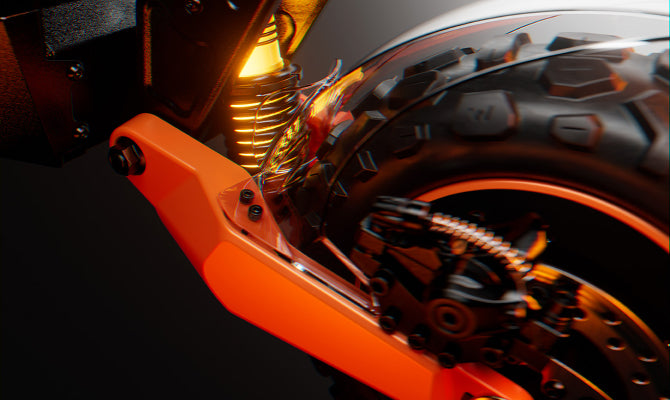 Close-up of an electric scooter front wheel featuring orange suspension arms and dual shock absorbers.